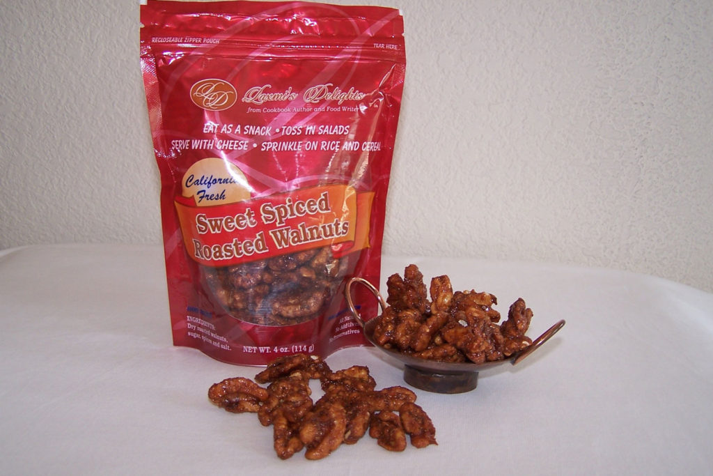 Bag and bowl of sweet spiced walnuts.